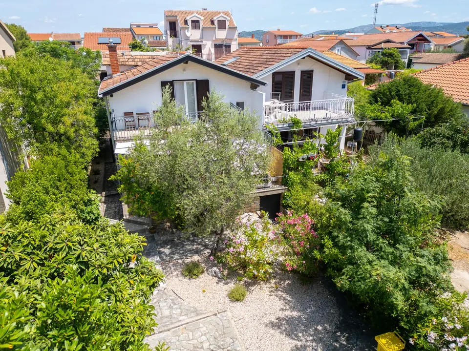 Aerial view of Holiday Home Dolphin and its garden, showing both balconies