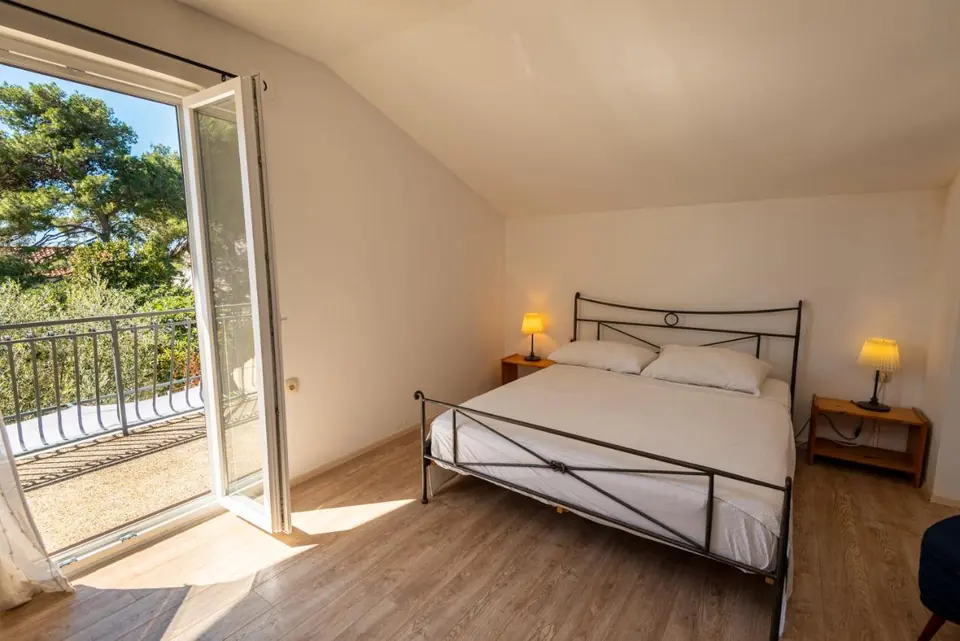 Bedroom with a large window
